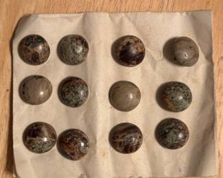 Antique buttons. Jasper stone? That’s what we think anyways. Sweet.