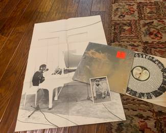 John Lennon LP record with all inserts and plastic film still on jacket