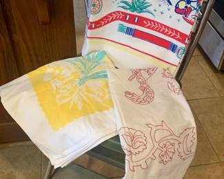 vintage printed table cloths, aprons, dish cloths