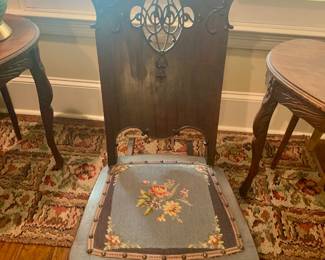 antique carved crest sewing rocker with needlepoint seat