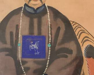 Qing Dynasty ancestor portrait featuring a palace badge,a sign of imperial power