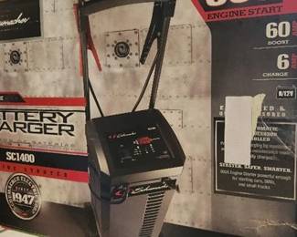 Automotive 6 Volt and 12 Volt 300 Amp Fully Automatic Wheeled Jump Starter and Battery Charger