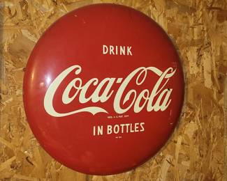 Coca Cola button sign