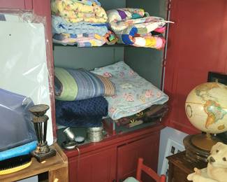 Painted cabinet and linens