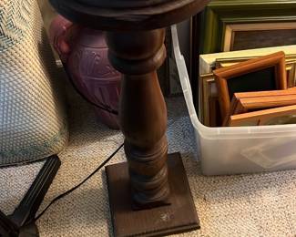 Wood and Marble Pedestal Stand — This wood and marble pedestal stand features a solid, turned wood column supporting a round white marble top. The base is square and sturdy, providing good balance. Measuring approximately 24 inches high and 10 inches wide at the marble top, it is a versatile piece suitable for displaying art, plants, or decor. The stand shows some wear consistent with age, including minor scuffs on the base. This classic design combines natural materials to create an elegant display stand.