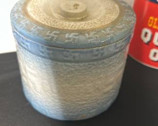 Blue Crock butter Covered Jar — This blue ceramic covered jar features a textured surface and a snug fitting lid with a small knob handle. The jar showcases a gradient blue glaze that fades from a deeper blue at the rim to a pale finish toward the base, giving it a charming handcrafted appearance. Measuring approximately 4 inches in height and 4.5 inches in diameter, it is suitable for decorative storage or accent display in the bonus up room. The piece is in good condition with no visible chips or cracks and retains its original glaze and structure. Its simple yet rustic design makes it a versatile home decor piece.