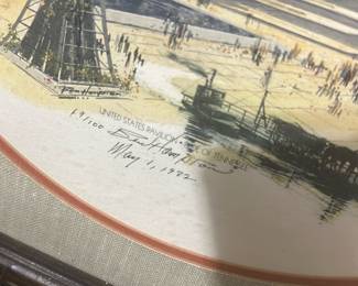 Signed Native Portrait Limited Print — Limited-edition lithograph featuring a Native American portrait with the Sunsphere and Tennessee World's Fair pavilion imagery, signed and dated May 1, 1982. The print is matted in a round opening with a linen-style mat and set in a dark wood frame; artist signature and edition number (e.g., 67/100) visible near the lower image. Overall framed piece is moderately large and suitable for a den or bonus room display. Condition is good with light surface wear to the mat and frame and no obvious tears to the print; glass appears intact but may have minor scuffs.
