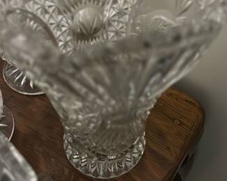 Vintage Hofbauer Byrdes Lead Crystal Vas — This vintage Hofbauer Byrdes lead crystal vase features fine craftsmanship using 24% lead crystal, made in Germany. The clear crystal vase showcases classic faceted design elements that catch and reflect light beautifully, making it an elegant decorative piece. It measures approximately 7 inches in height and 5 inches in width, perfect for display on a mantel or shelf. The vase is in good condition with minor signs of wear consistent with age, with no visible chips or cracks. Hofbauer Byrdes pieces are renowned for their quality and heritage, adding value and interest for collectors.