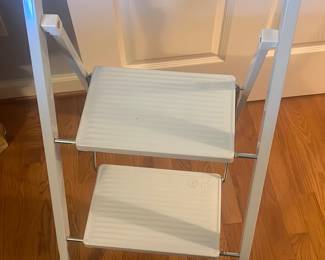 white Rubbermaid 2-step steel stool