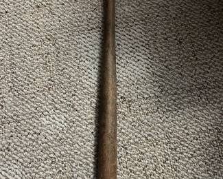 Hillerich & Bradsby Baseball Bat — Hillerich & Bradsby (H&B) wooden baseball bat from Louisville, KY, stamped DC5 on the barrel. Solid ash/wood construction with natural finish and visible use wear, including ball marks and light dents consistent with play or age. Measures approximately 34 in long with a 2.5 in knob diameter (see dimensions) and is a sturdy collectible or display piece for a sports room. Overall in fair condition with cosmetic wear but no major cracks or breaks visible; ready for display or light use.