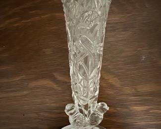 Hofbauer Lead Crystal Vase Germany — This Hofbauer lead crystal vase showcases elegant craftsmanship, made from 24% lead crystal in Germany. The vase features intricate cut designs with bird motifs, reflecting classic crystal artistry. Standing approximately 10 inches tall with a flared opening and decorated base, it is an excellent decorative accent for any room. The vase is in very good condition with no visible chips or cracks. Hofbauer is renowned for quality crystal, making this a fine collectible piece.