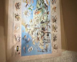 North Carolina Wildlife Places Map — Colorful illustrated North Carolina wildlife map poster showing state landmarks, animals and coastal life. Printed poster on paper with illustrated border vignettes and title text; appears unframed and stored flat in a cardboard box in the bonus up room. Estimated overall size fits a large poster — see dimensions below — and it's lightweight for easy pickup. Condition appears good with slight edge wear and small corner dings visible in photos but no major tears or stains.