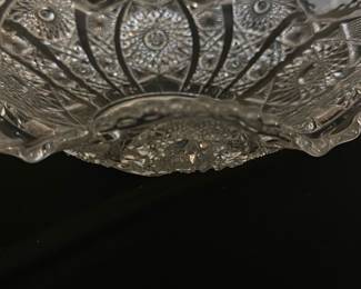 Vintage Daisy & Button Glass Bowl — This vintage Daisy & Button clear glass bowl features a distinctive scalloped edge and detailed pressed glass pattern, showcasing classic craftsmanship. The bowl is heavy and robust, making it ideal for display or serving. It measures approximately 8 inches in diameter and stands about 2.5 inches tall. The bowl is in good condition with no visible chips or cracks, preserving its vintage charm. Perfect for collectors or as an elegant decorative piece, this bowl embodies mid-20th century glassware design.