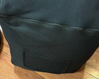 Black Fabric Soft Cube Ottoman — This versatile black fabric soft cube ottoman offers flexible seating or footrest options for any room. Constructed with a durable woven fabric cover and a soft, cushioned interior, it fits nicely into compact spaces or serves as an easy add-on to your living area. Approximate dimensions are 18 inches height, 18 inches width, and 18 inches depth, making it lightweight and easy to move around. The ottoman is in good condition with minor surface wear visible from light use. Ideal as casual furniture in lounges, bedrooms, or basement rooms for added comfort.