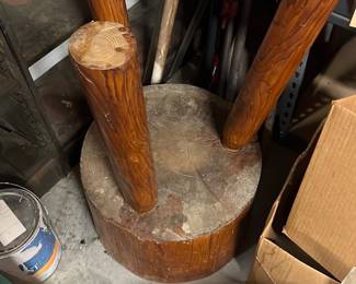 three-legged wood stool