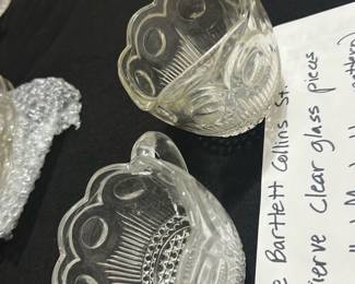 Bartlett Collins cream and sugar — These vintage Bartlett Collins clear glass pieces feature the Genevieve or Manhattan pattern, typically manufactured in the 1960s. The set includes a cream and sugar with distinctive scalloped edges and intricate pressed glass design. Each piece measures approximately 3.5 inches tall and 4.5 inches wide, perfect for serving cream and sugar. The items are in good condition with no visible chips or cracks, showcasing classic mid-century American glassware design. These collectible pieces add a touch of nostalgic charm to any dining or tea setting.