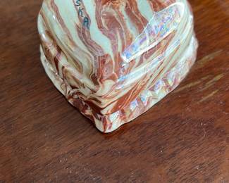49th Originals Marbled Heart Trinket Box — This charming 49th Originals heart-shaped trinket box features a distinctive marbled pattern in earthy brown and cream tones. Crafted from ceramic, its hinged design reveals a smooth interior perfect for storing small keepsakes. The box measures approximately 3.5 inches wide, 3.5 inches long, and 2 inches tall, making it a compact and decorative accent piece. It is in good condition with minor surface wear consistent with careful use. Marked on the bottom with "49th Originals NC," this piece reflects quality craftsmanship from this maker.