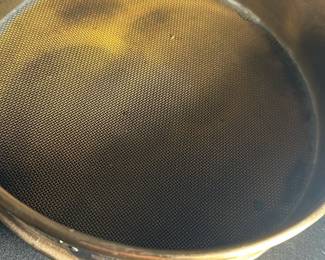 W.S. Tyler No. 20 Standard Sieve — This vintage W.S. Tyler Company No. 20 standard sieve is a precision scientific instrument used for particle size analysis. It is made of durable metal with a fine mesh screen featuring an opening of 841 microns or 0.0331 inches, suitable for laboratory or industrial use. The sieve measures approximately 3 inches tall with a diameter of 8 inches, offering robust construction and reliable performance. It is in good condition with some signs of wear consistent with use but fully functional. Manufactured in Cleveland, Ohio, this sieve is a classic piece from a reputable maker and is ideal for collectors or professionals requiring standard sieve testing equipment.