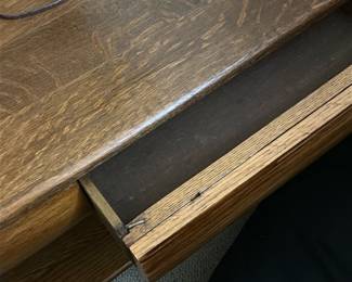 Oak Wood Queen Anne Style Table — This elegant oak wood table features Queen Anne style cabriole legs with claw feet, offering a classic and refined look. The rich wood grain is visible throughout, complemented by a smooth rectangular top and a functional lower shelf for additional storage or display. The piece includes a small drawer with dovetail joints, enhancing both utility and craftsmanship. It measures approximately 24 inches high, 26 inches wide, and 18 inches deep, making it suitable for bedroom or living room use. The table is in good condition with typical light surface wear and minor scratches consistent with age and use.