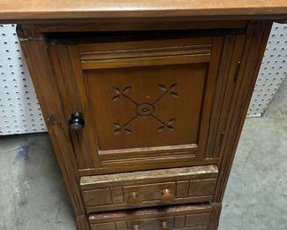 antique Victorian-style tiger oak cabinet