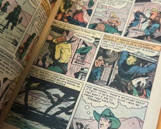 Wild Bill Hickok Bloody Canyon — Classic Wild Bill Hickok comic titled "Bloody Canyon Massacre" featuring western action and pulp-style cover art. Paperback comic shows interior panels with vintage coloring and speech balloons; cover reads 10c No.13 and includes a "Classics Illustrated" piece visible beneath. Measures approximately standard comic size with light edge wear, creases, and toned pages consistent with age; spine shows handling wear but pages appear intact. Overall condition is fair for a mid-20th-century pulp comic; good display piece for collectors of western comics though not graded.