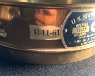 W.S. Tyler No. 20 Standard Sieve — This vintage W.S. Tyler Company No. 20 standard sieve is a precision scientific instrument used for particle size analysis. It is made of durable metal with a fine mesh screen featuring an opening of 841 microns or 0.0331 inches, suitable for laboratory or industrial use. The sieve measures approximately 3 inches tall with a diameter of 8 inches, offering robust construction and reliable performance. It is in good condition with some signs of wear consistent with use but fully functional. Manufactured in Cleveland, Ohio, this sieve is a classic piece from a reputable maker and is ideal for collectors or professionals requiring standard sieve testing equipment.
