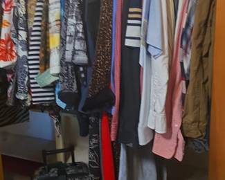 Assorted Mens and Womens Clothing in Closet