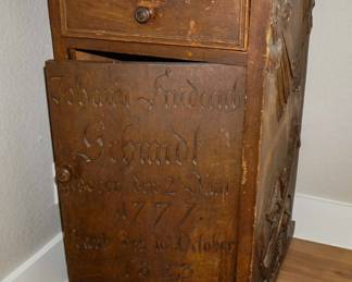 Antique carved memorial cabinet