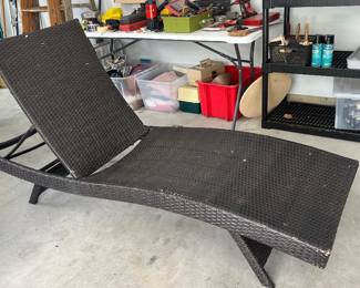 Outdoor brown wicker chaise lounge