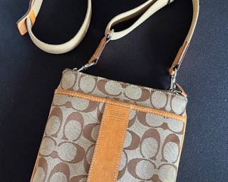 Coach Signature tan leather canvas sling bag