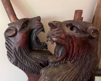 ROAR!Carved wooden lions