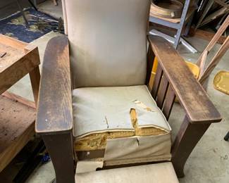 #205	vintage stickley chair with pull out stool as is needs new covering 	 $65.00 