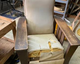 #205	vintage stickley chair with pull out stool as is needs new covering 	 $65.00 