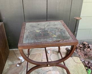 #180	metal with glass top table rust look 21x20x21 heavy	 $100.00 