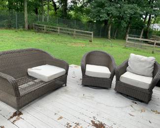 #145	3 piece plastic wicker set love seat and 2 swivel rocker chairs with 3 cushions 1 as is chair seat	 $75.00 