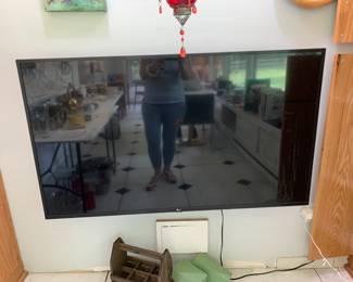#52	LG Flatscreen TV Mounted model 55UM7300PUA - 55" Size w/remote  - You Remove	 $75.00 