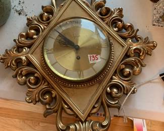 #135	Syroco Mid-Century Gold Clock w/glass Close w/key - 5 day clock	 $75.00 