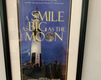 #161	framed poster of a smile as big as the moon rocket January 2012 13x22	 $30.00 