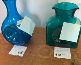 #143	Blue blown glass vase  9.5 tall	 $30.00  #144	green blue blown glass  vase 8 inch tall	 $45.00 