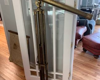 #201	brass telescope  on adjustable legs 	 $800.00 