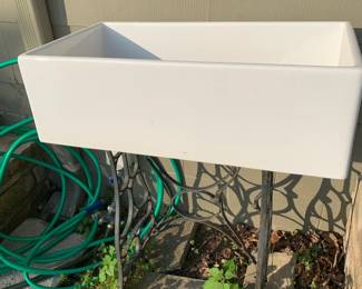 #257	cast iron porclain coated sink on a iron sewing machine base dog/garden wash	 $125.00 