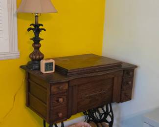 Antique sewing machine cabinet