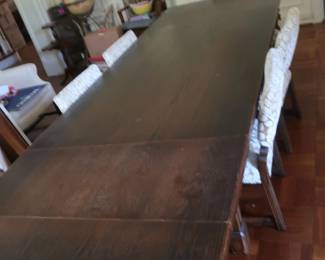 * Dining room table fully extended. There are 6 chairs. $395.00