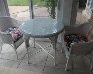 * wicker table and two chairs in Florida room $75.00