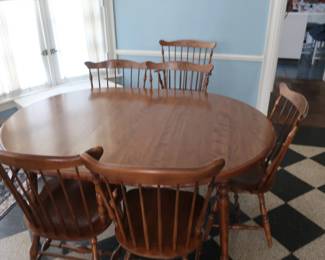 Dinette set with 6 chairs Inside of chairs are painted on front top side.