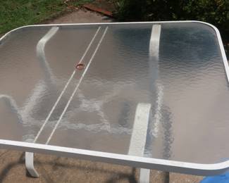 * glass top table $ 40.00