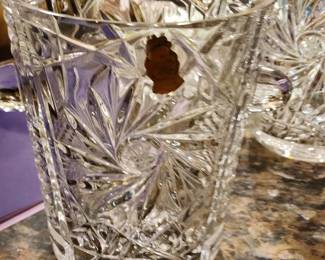 Several heavy lead crystal ice buckets