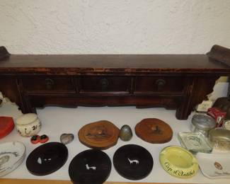 Asian style shelf, vintage ashtrays.