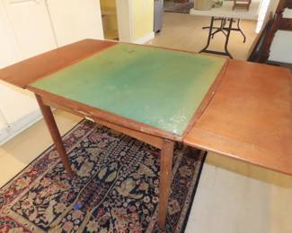 Teak games table. (needs refinishing), games table to dining table.