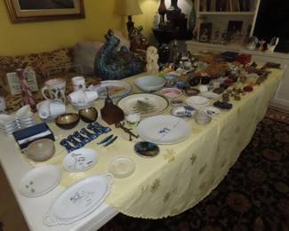 tables of trinket boxes and ceramics.